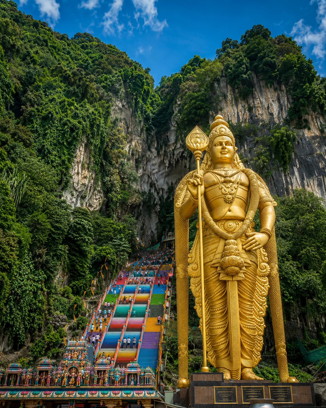 Batu Caves colorful staircase and golden statue